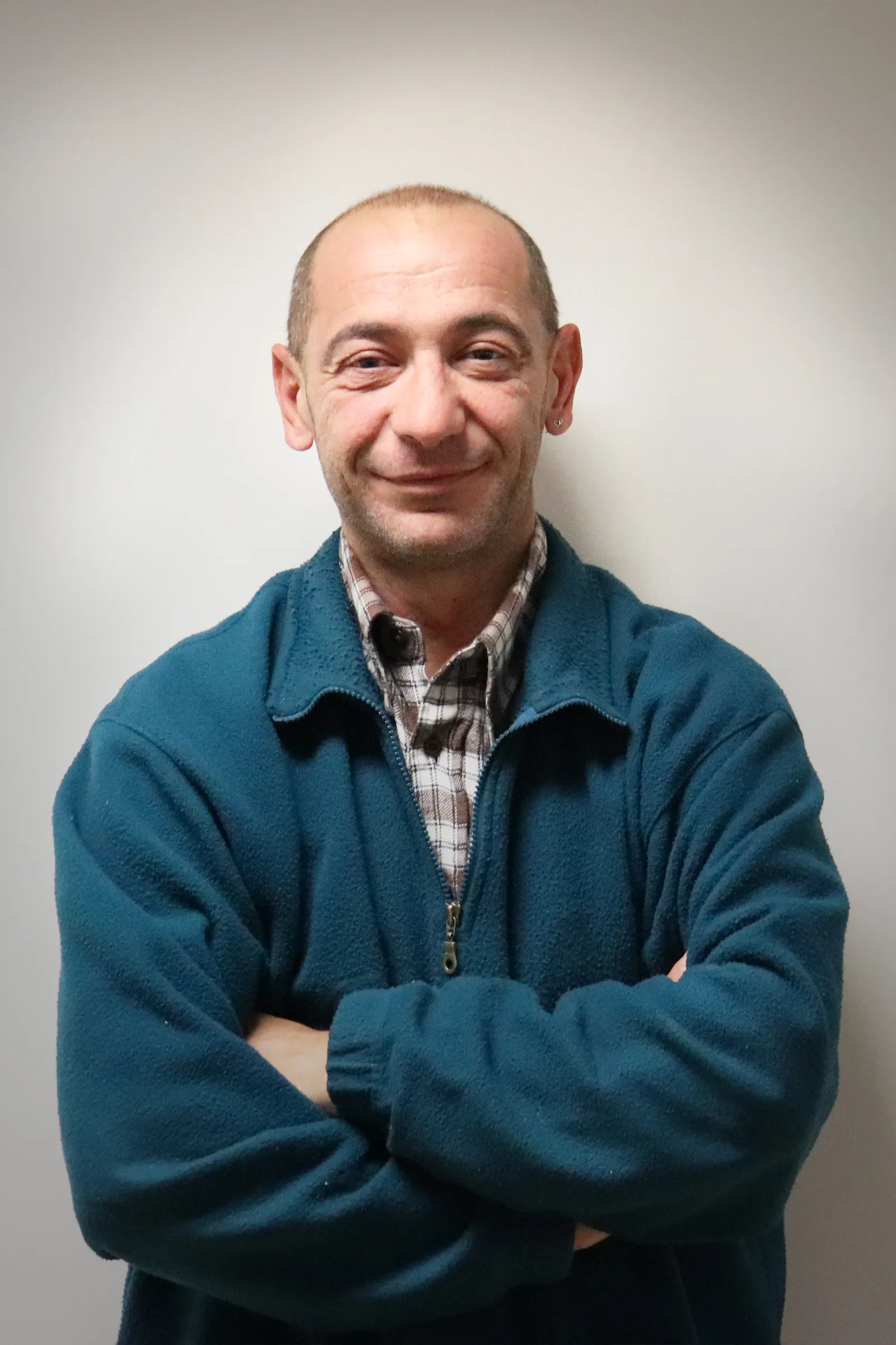 Bacco, manager of Camelias Parking, smiling